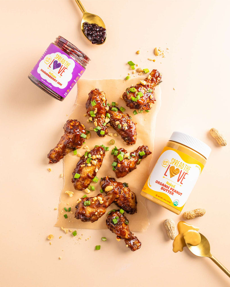Table with Crispy Air Fryer PB&J wings with Marionberry Jam and NAKED Organic Peanut Butter