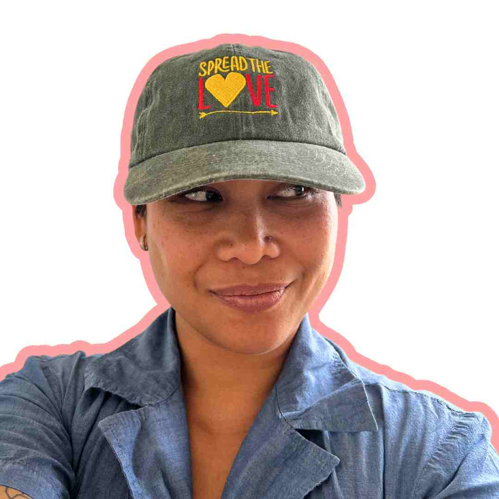 Val in Spread The Love Olive Dad Hat