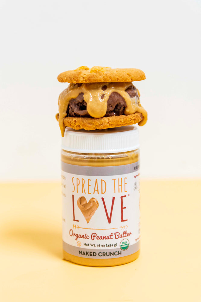 Spread The Love Peanut Butter jar with Peanut Butter Capn’ Crunch Cookie Ice Cream Sandwich on top
