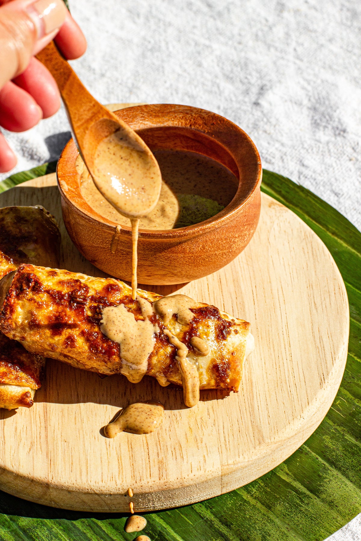 Banana and jackfruit turon with Almond Butter drizzle