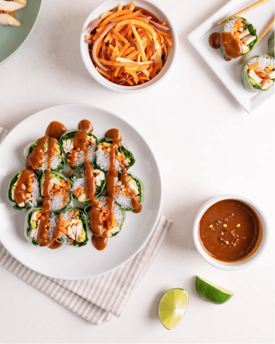 Plate of Sushi Roll Bites with savory almond butter sipping sauce 