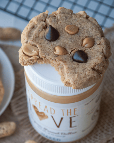 Spread The Love Peanut Butter jar with Peanut Butter Chip Cookie on top