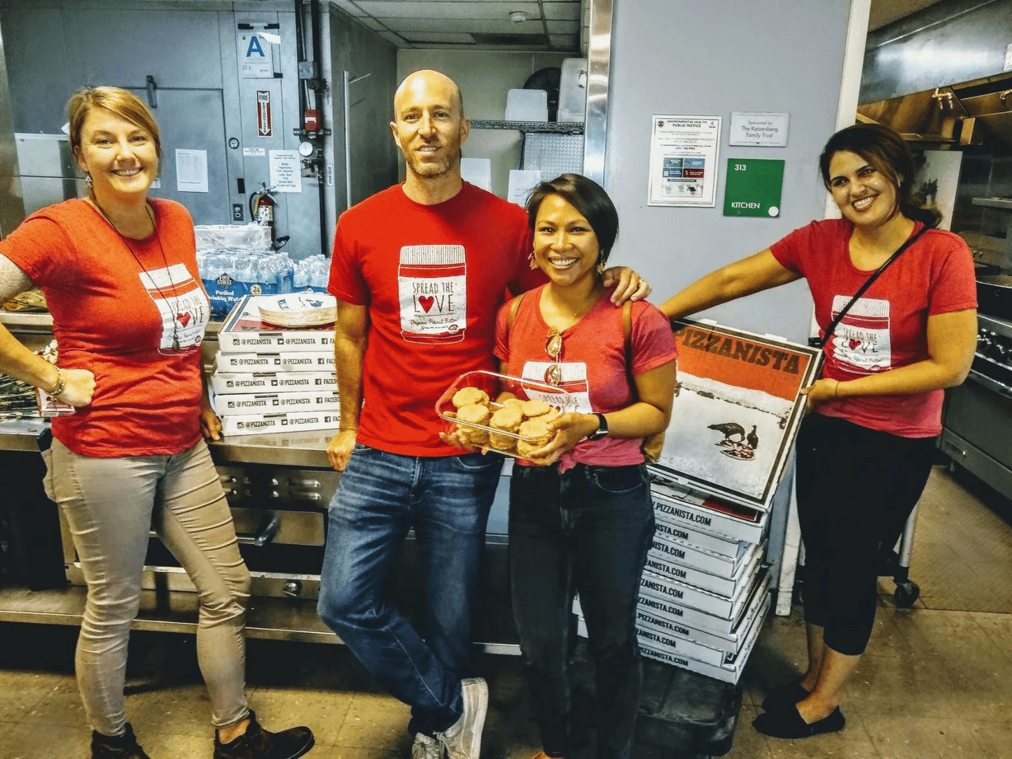 Zach and Val and other volunteers at Path's "Slice of Hope" Event