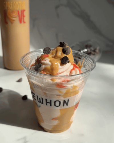 copycat homemade version of Erewhon's Strawberry Glaze Soft Serve Sundae made with Spread The Love Peanut Butter
