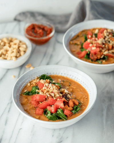 Two bowls of Spicy Peanut Butter Soup 