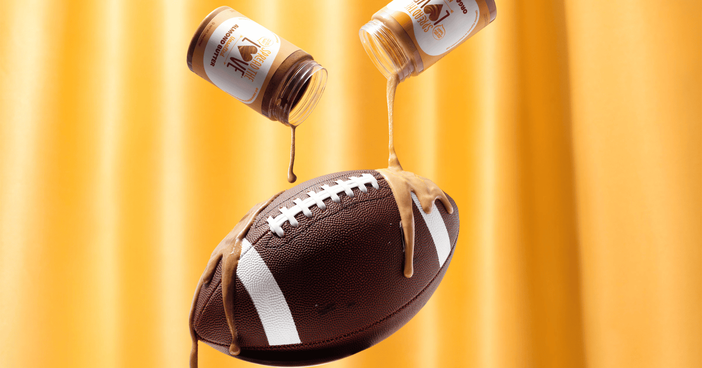 Spread The Love Almond and Peanut Butter being poured  onto football