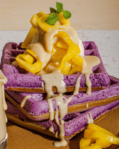 Plate of Ube Waffles with Cashew Coconut Sauce 