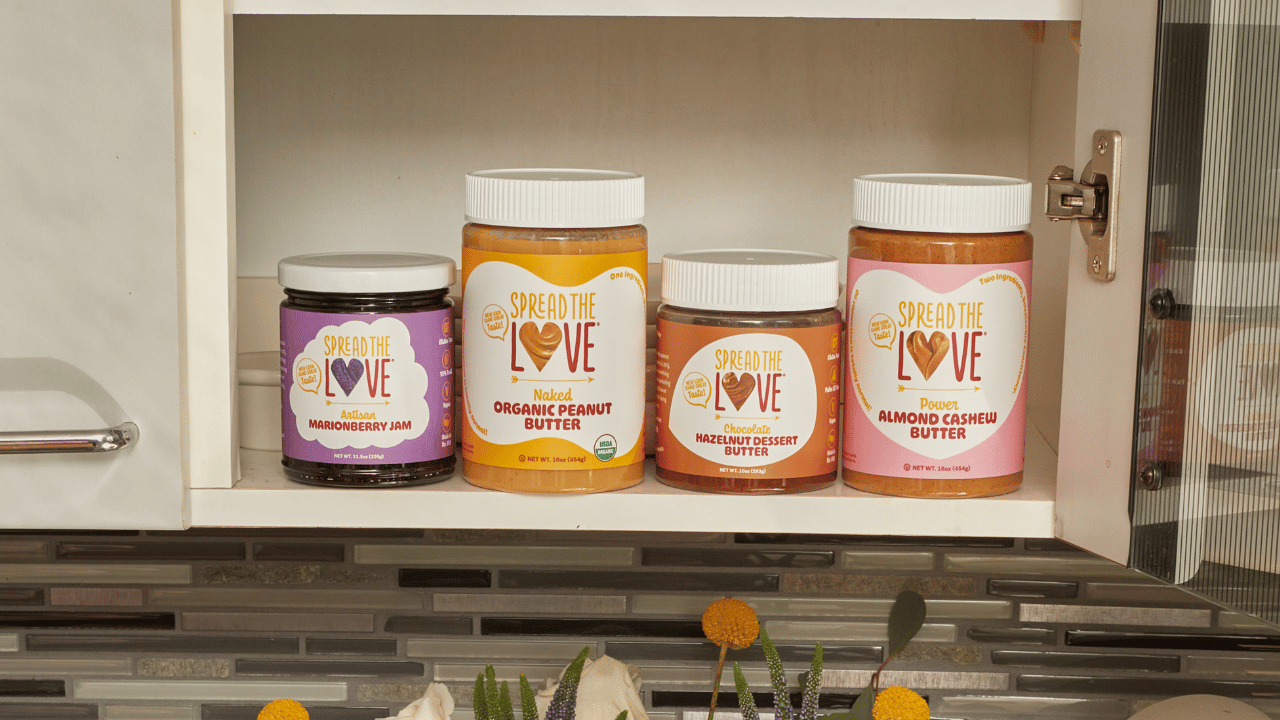 STL Jam, peanut butter, Choco Hazelnut and Almond Cashew Jars in a cabinet