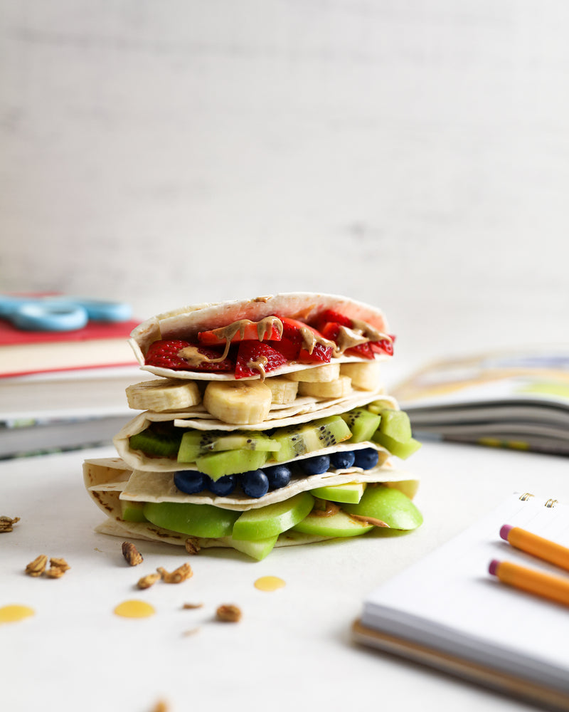 Stack of Tortilla Fruit Wraps with Spread The Love Nut Butter