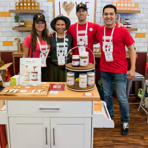 Spread The Love Team at the Spread The Love Booth in Expo West 2019