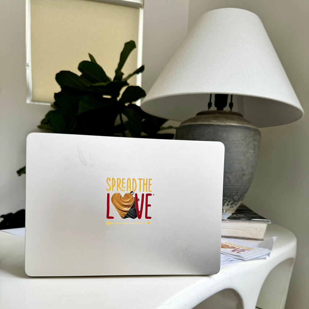 
                  
                    Load image into Gallery viewer, Spread The Love Transfer Sticker on a mac book laptop 
                  
                
