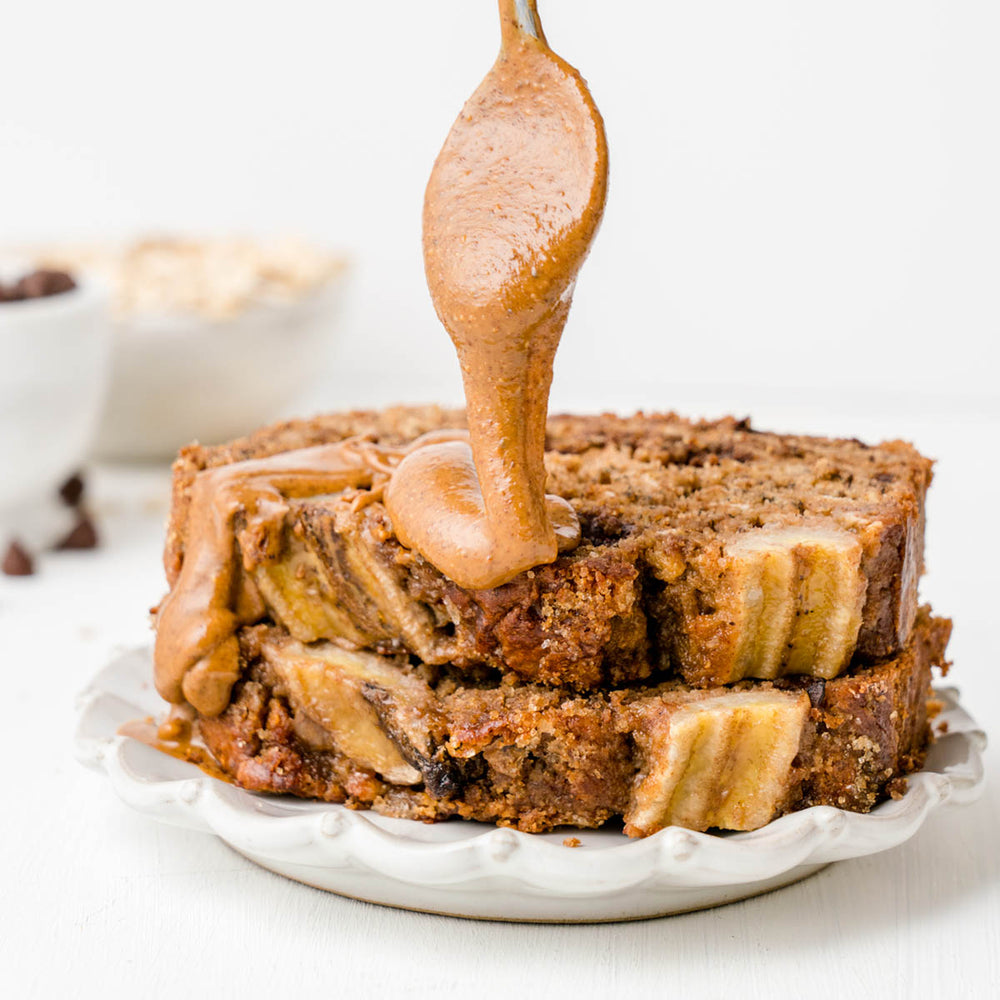 Almond Butter Drizzle on two slices of almond butter banana bread