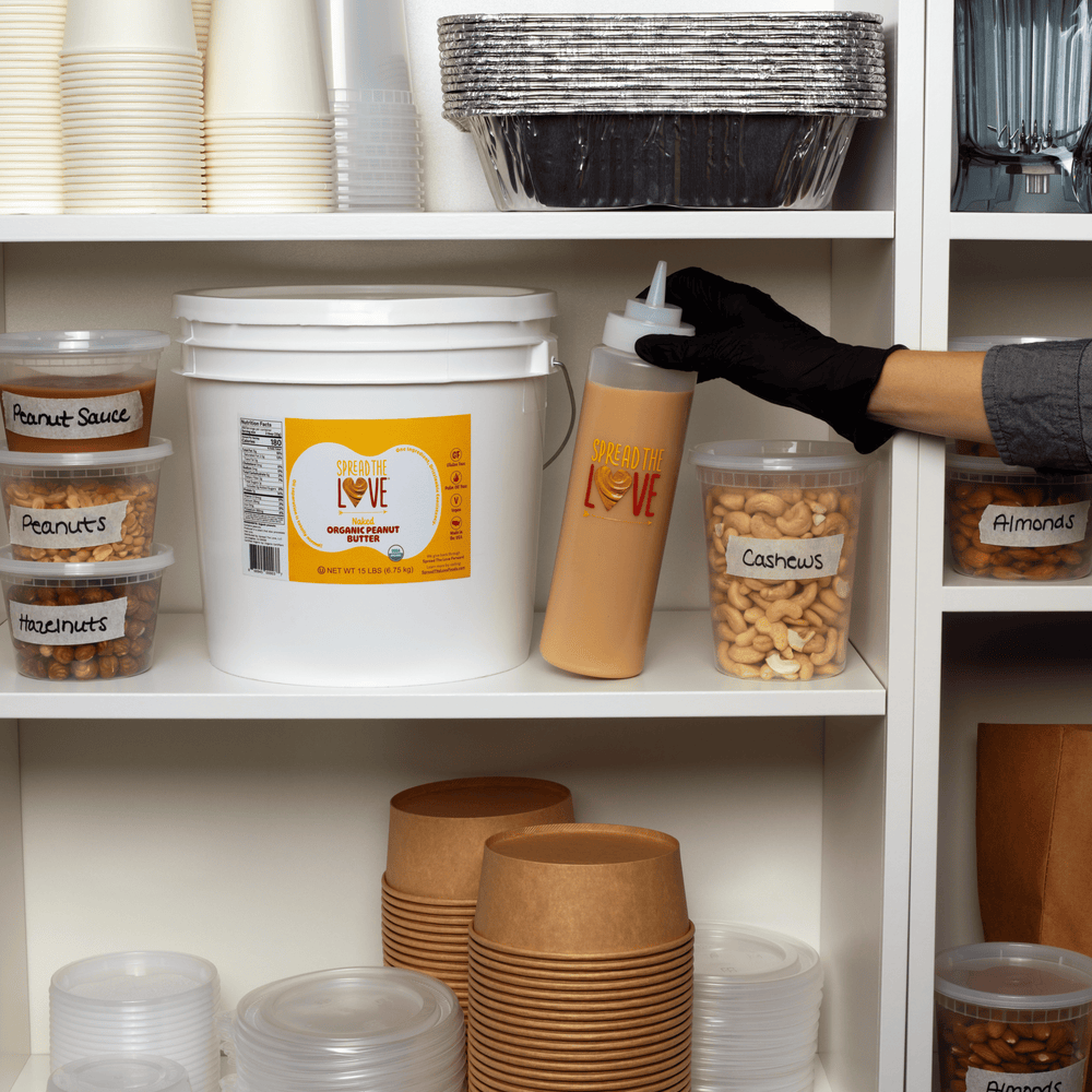 
                  
                    Load image into Gallery viewer, Spread The Love PB Pail in Storage with squeeze bottle
                  
                