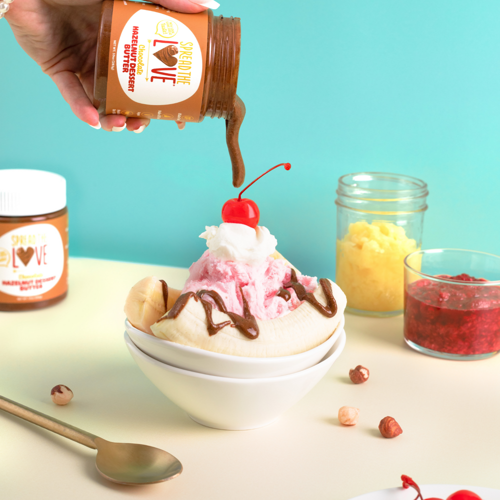 
                  
                    Load image into Gallery viewer, Spread The Love Chocolate Hazelnut Dessert Butter drizzle on banana split ice cream sundae
                  
                