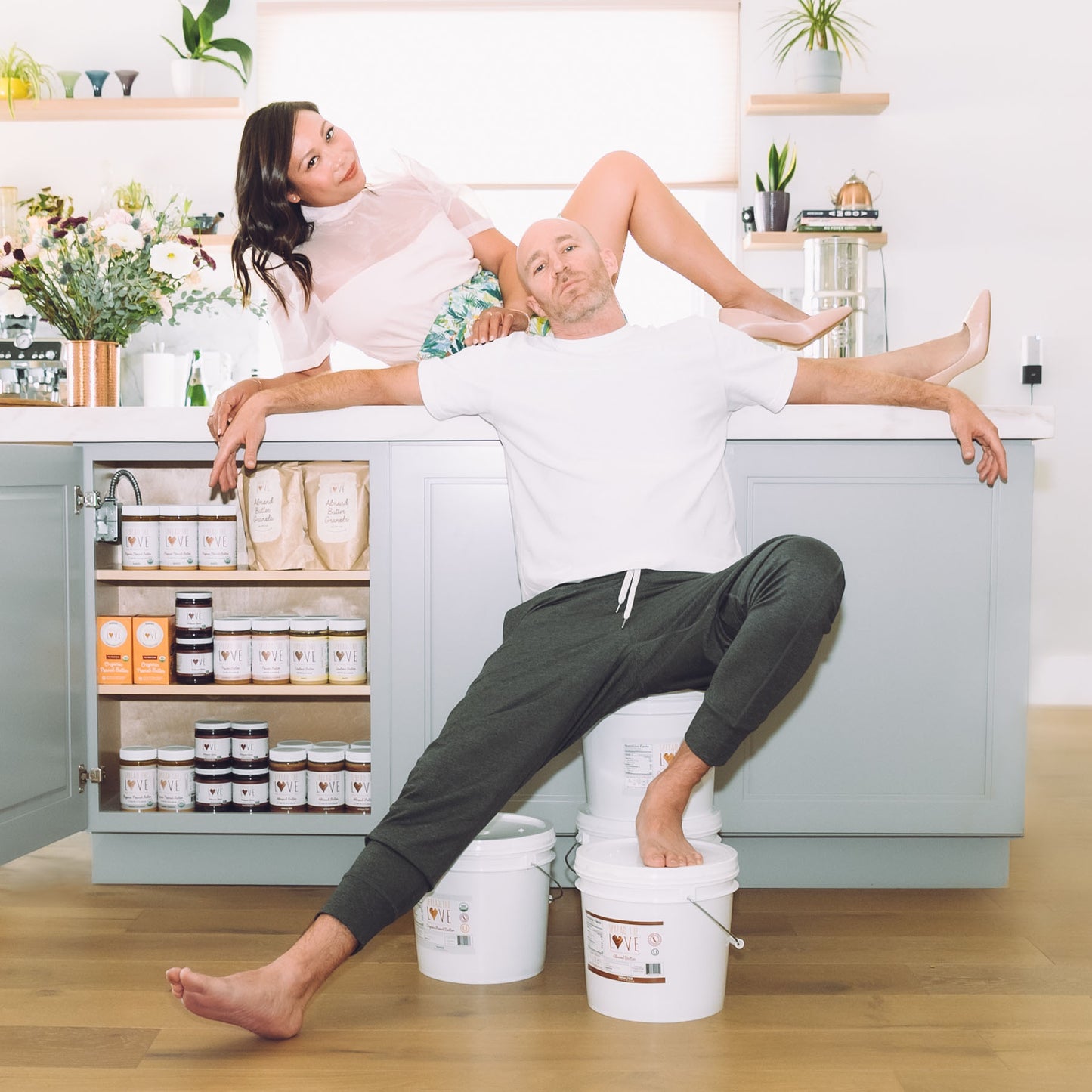 Zach and Val Fishbain posing with Spread The Love Products
